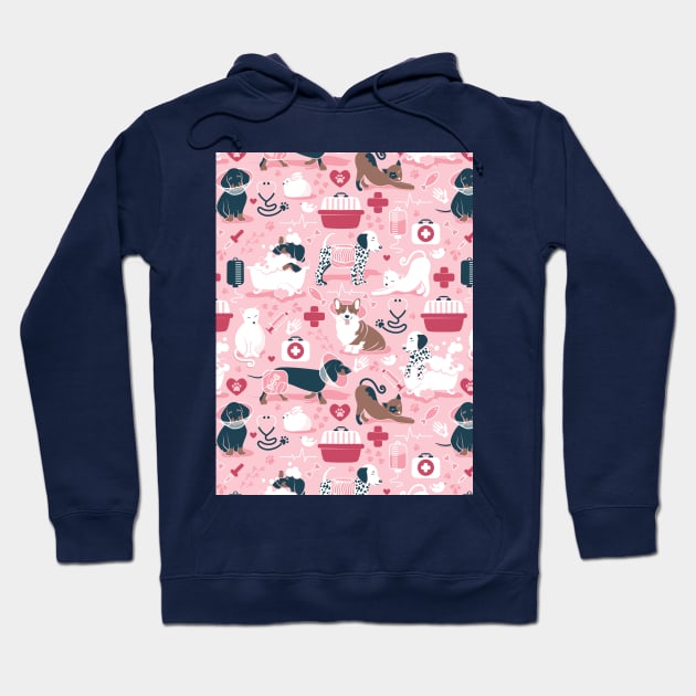 Veterinary medicine, happy and healthy friends // pattern // pastel pink background red details navy blue white and brown cats dogs and other animals Hoodie by SelmaCardoso